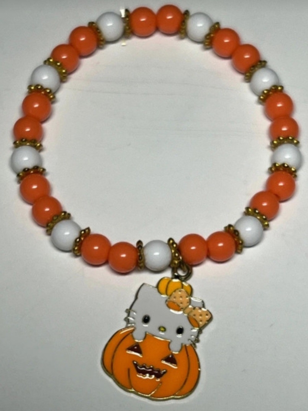 Hello Kitty Halloween bracelet with orange Pumpkin